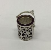 A silver pierced thimble case. Birmingham. Approx.