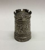 A heavy Indian chased silver pepper grinder. Approx. 80 g