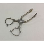 CHESTER: A pair of silver ice tongs in Georgian st