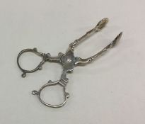 CHESTER: A pair of silver ice tongs in Georgian st