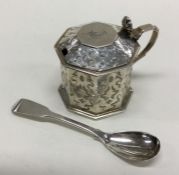 A Victorian silver mustard pot with chased decorat