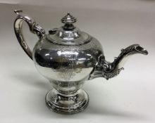 A good George III silver engraved bachelor's teapo