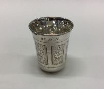 WITHDRAWN: A Russian engraved silver beaker. Marked to base.