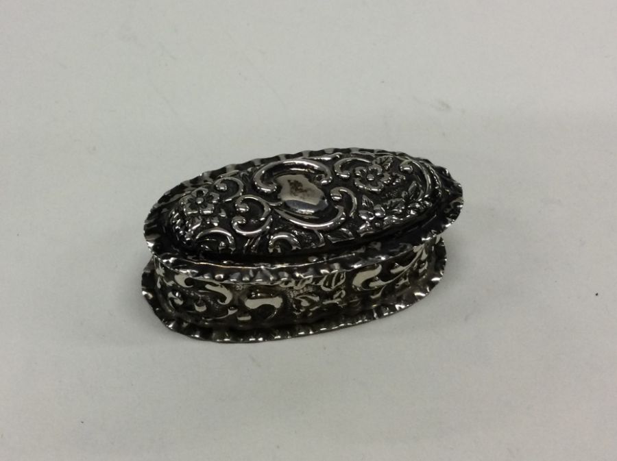 A Victorian chased silver hinged top box. Birmingh