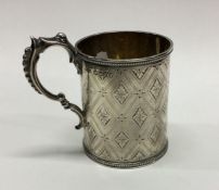 A Victorian silver christening cup / mug with engraved decorat