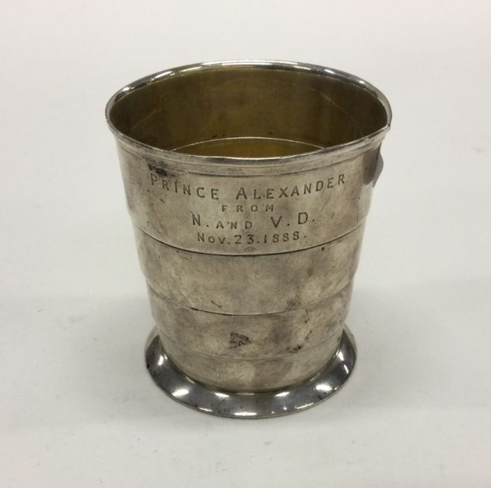 A tapering silver beaker depicting Prince Alexande