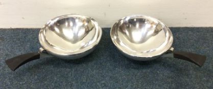 GEORG JENSEN: A rare pair of circular silver dishe