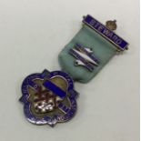 OF ROYAL INTEREST: A silver and enamelled medal. L