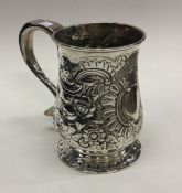 NEWCASTLE: A heavy chased silver mug. 1757. By Joh