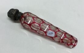 A silver topped cranberry glass scent bottle. Est.