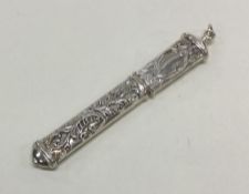 A chased silver cheroot case. Approx. 10 grams. Es