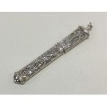 A chased silver cheroot case. Approx. 10 grams. Es