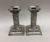 A pair of attractive Edwardian silver chased Corin