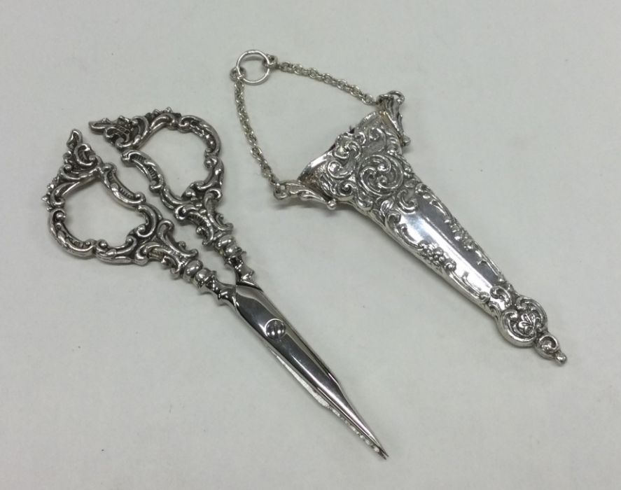 A chased pair of silver handled scissors. Birmingh - Image 2 of 2