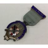 OF ROYAL INTEREST: A silver and enamelled medal. L