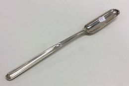 An 18th Century crested silver marrow scoop. Est.