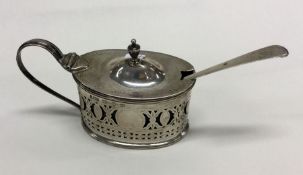 A heavy oval silver boat shaped mustard pot with B