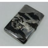 A Japanese silver cigarette case. Marked to interi