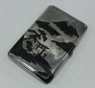 A Japanese silver cigarette case. Marked to interi