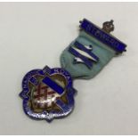 OF ROYAL INTEREST: A silver and enamelled medal. L