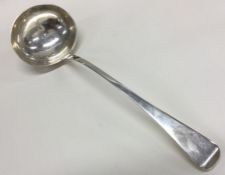 A George III silver ladle. London 1829. By William