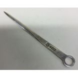 A heavy silver letter opener. Approx. 56 grams. Es