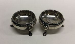 A heavy pair of Georgian silver salts with gadroon