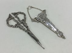 A chased pair of silver handled scissors. Birmingh