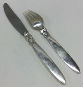 GEORG JENSEN: A silver knife and fork. Approx. 146