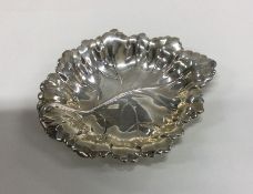 A silver dish in the form of a leaf. Birmingham 19