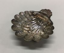 A good Georgian style silver butter shell with cha