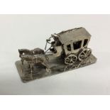 An Antique Dutch silver toy horse and carriage. A