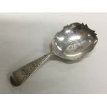 A rare William IV silver caddy spoon with sharp ed