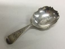 A rare William IV silver caddy spoon with sharp ed