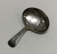 A good Georgian silver caddy spoon with bright cut
