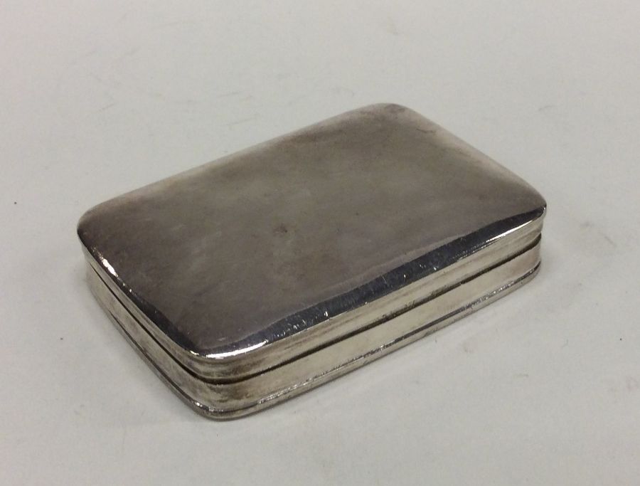 A large rectangular silver hinged top box. Marked