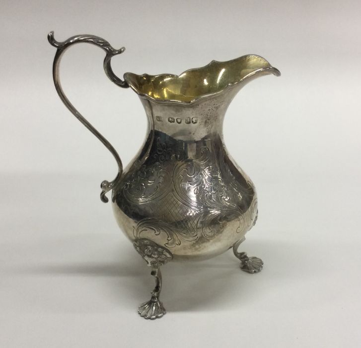 A heavy Victorian silver cream jug. London. By FD.
