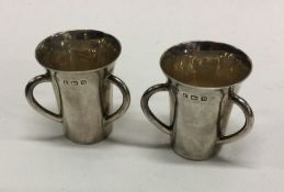 A good pair of small three handled Tygs. Sheffield