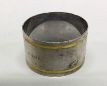 A silver and enamelled napkin ring. Birmingham 193
