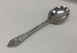 A chased silver spoon in Charles 1 style. Approx.