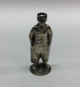 A Dutch silver figure of a boy with textured body