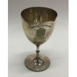 A silver plated goblet. Est. £20 - £30.