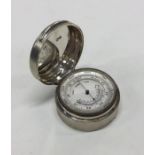 A rare and unusual cased silver barometer. London 1914. By