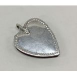 A heart shaped pin cushion. Birmingham. Approx. 20