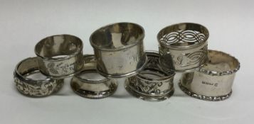 A bag containing silver napkin rings. Various date