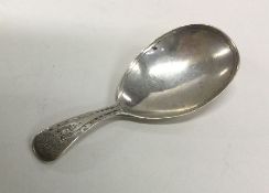 A rare small sized Georgian silver caddy spoon. Bi