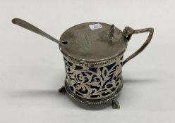 A Victorian silver crested mustard pot with pierce