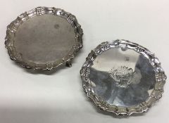 A good pair of Georgian silver waiters with creste