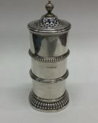 A heavy Arts & Crafts silver sugar caster with bal