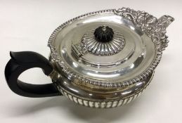 A good Edwardian silver half fluted teapot of squa